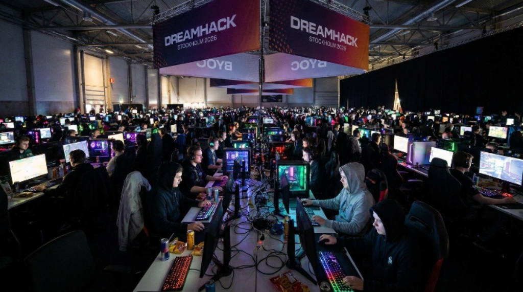 BYOC hall glowing with monitors at DreamHack Stockholm 2026